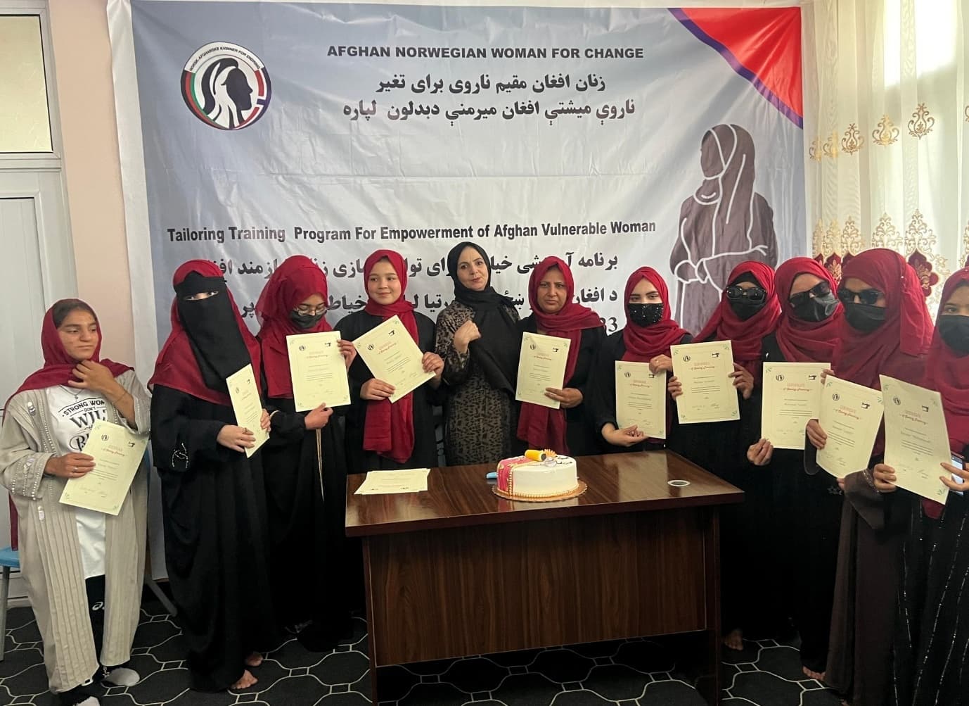 Participants gathered at a graduation ceremony at a tailoring training centre in Kabul